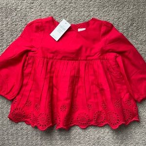 Red top for baby girl.